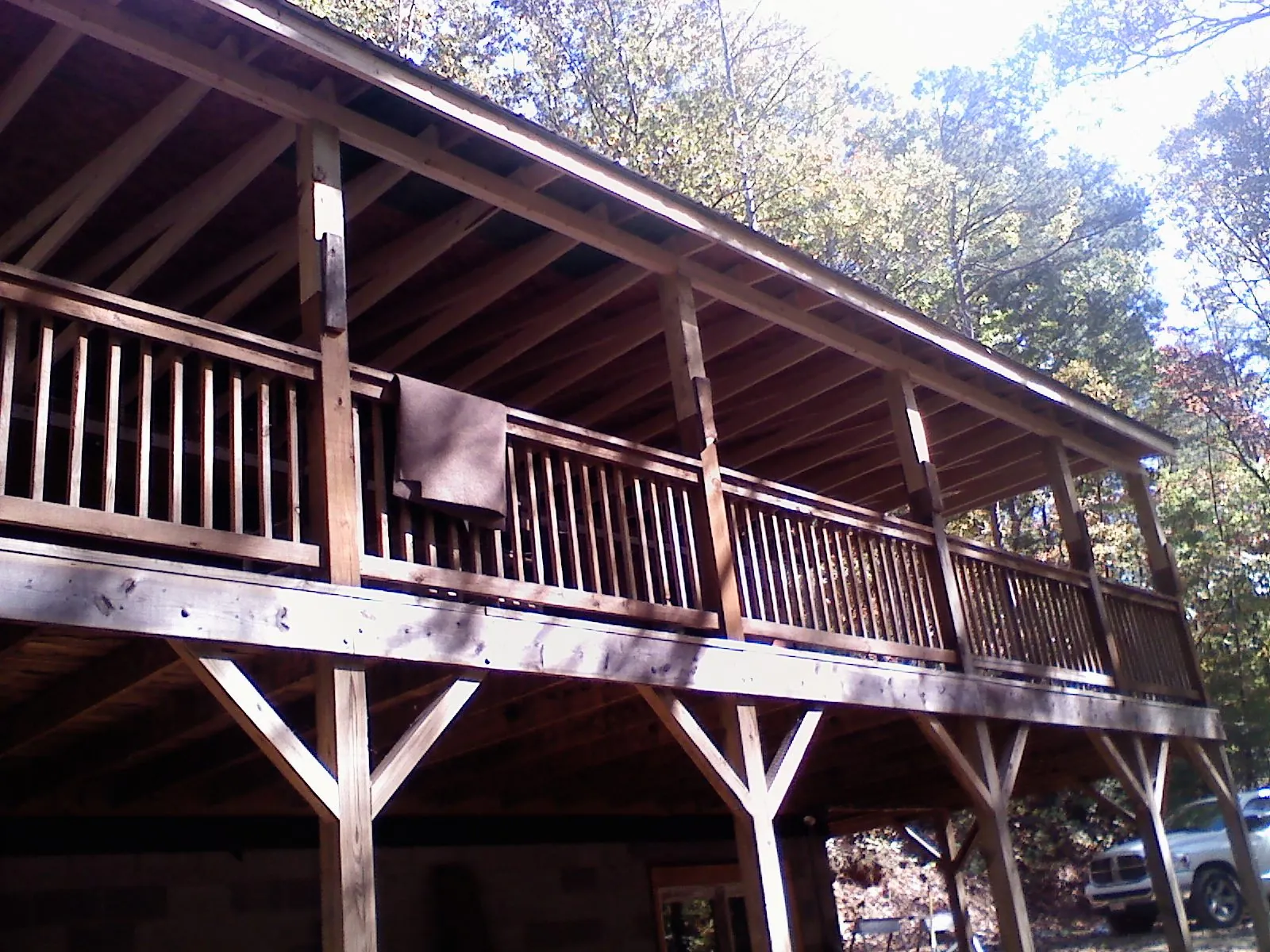 Timber framing under a new elevated porch and deck — Roof Leak Repair in Lytle Creek by Roofing Brothers